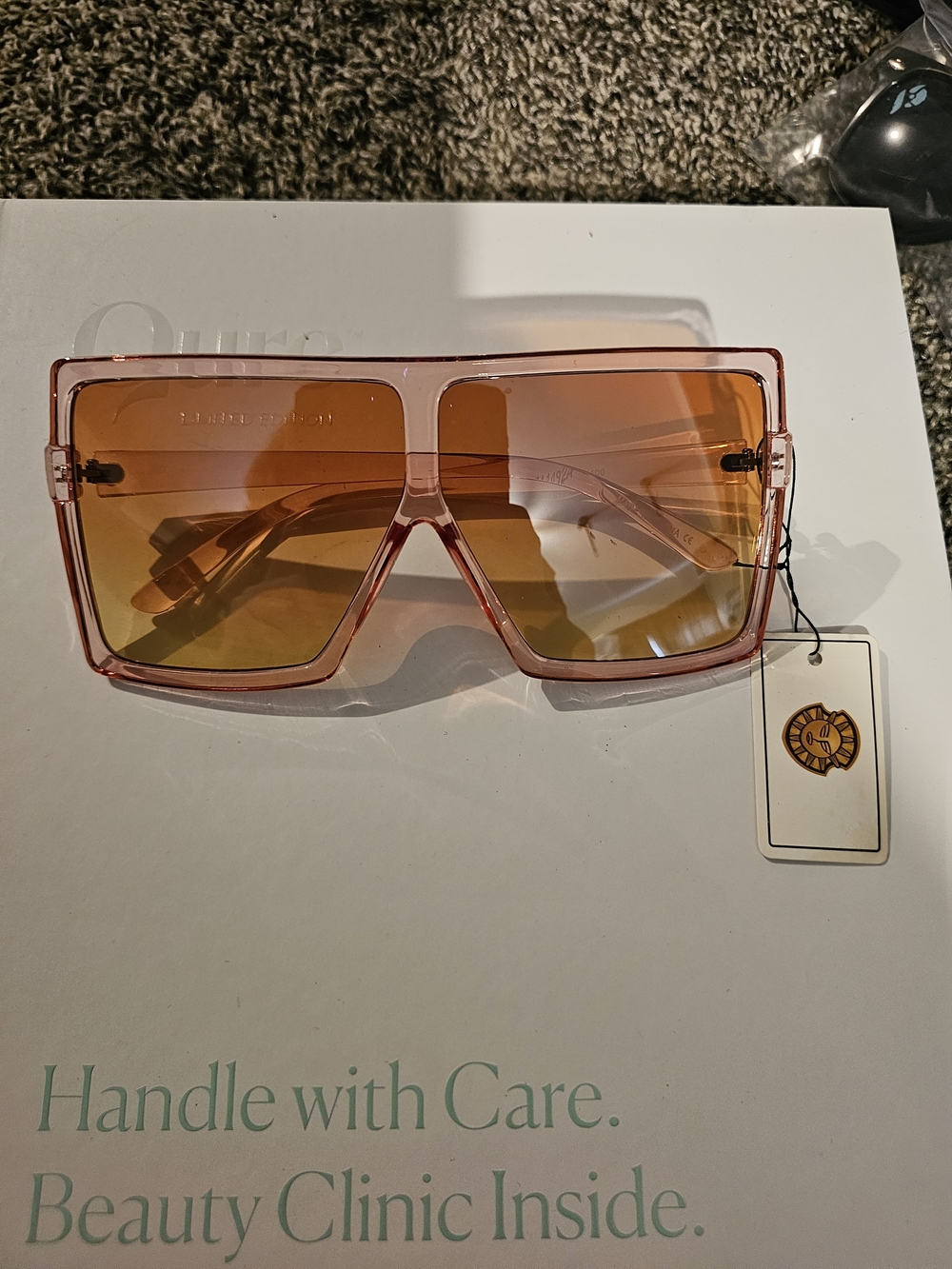 Translucent Pink Shield Sunglasses with Orange Gradient Lenses